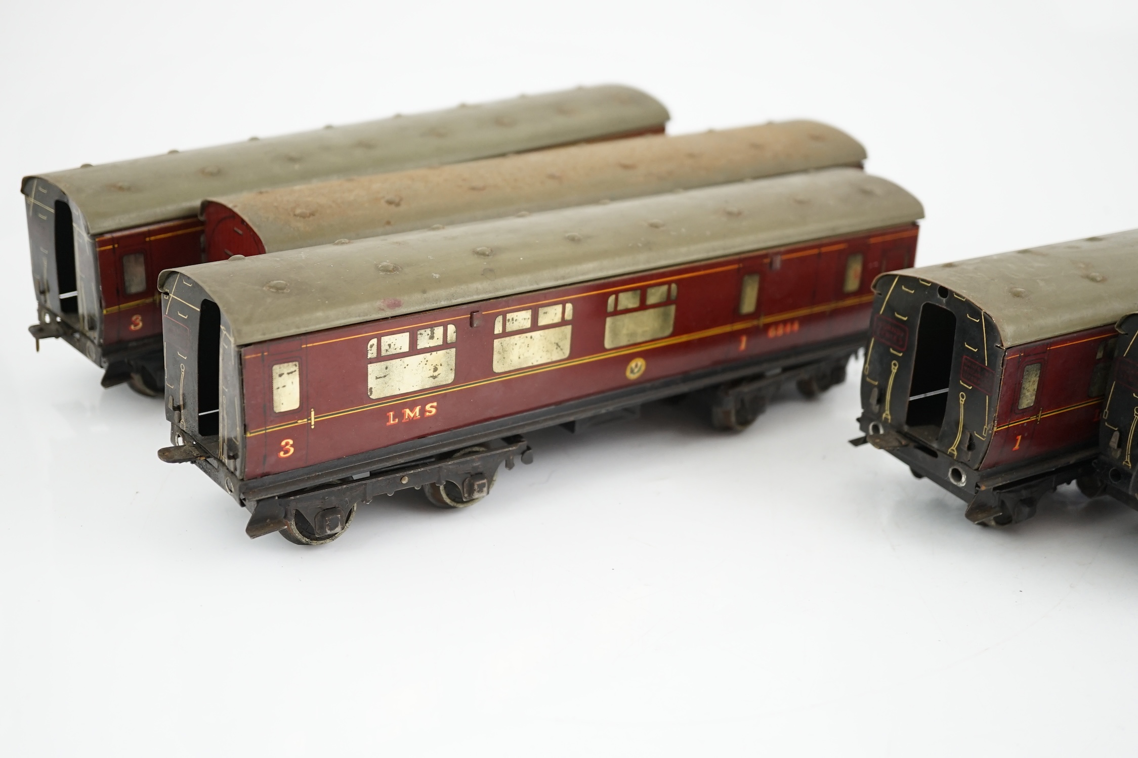 Five Hornby 0 gauge tinplate No.2 coaches in LMS livery